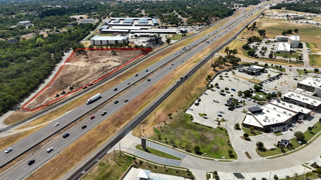 Drone photo from the northeast of the 20 West site today, outlined in red beside Interstate 20